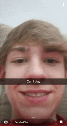 a close up of a person 's face with the words " can i play " written on it