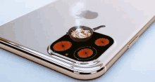 a close up of an iphone with a pan on it