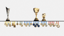 a row of trophies and medals with one that says ' winner '