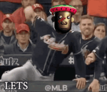 a baseball player with a sombrero on stands in front of a sign that says " lets @mlb "