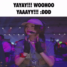 a woman wearing a headset and gloves says yayay woohoo yaaay ddd