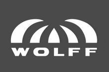 a white wolff logo on a dark background