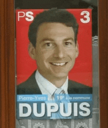 a man in a suit and tie is smiling on a ps 3 dupuis poster