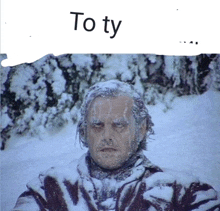 a picture of a man in the snow with the words " to ty " below him