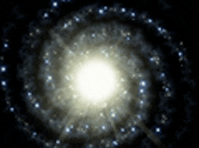 a spiral galaxy with a white center in the middle of the galaxy