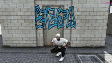 a man is squatting in front of a wall with graffiti on it that says zeba