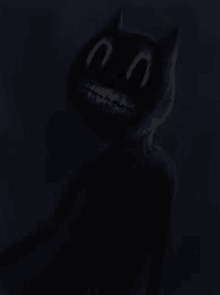 a cartoon cat with a big smile on its face is in the dark .