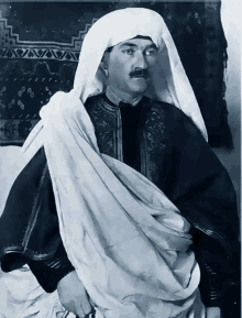 a black and white photo of a man wearing a white veil