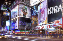 a billboard for guest suites sits in the middle of a busy city street