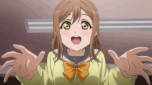 a girl in a yellow shirt with a bow on her bowtie is reaching out her arms