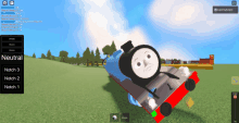 a screenshot of a video game shows a thomas the train laying on the ground