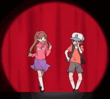 a boy and a girl are standing on a stage in front of a red curtain