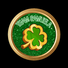 a gold circle with a clover and the words team samuela on it