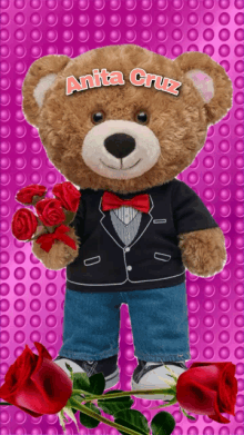 a teddy bear with the name anita cruz on it holding roses