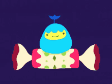 a blue cartoon character with a yellow face sits on top of a candy