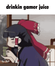 a girl is drinking gamer juice from a green cup .