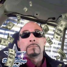 a man wearing sunglasses and a cowboys logo is surrounded by falling money