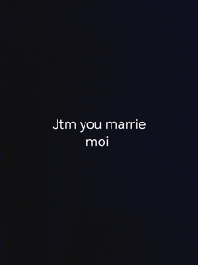 a black background with the words jtm you marrie moi written on it