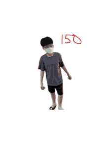 a boy wearing a mask and shorts with the number 150 written on the bottom