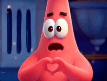 patrick star from spongebob squarepants making a heart shape with his hands .