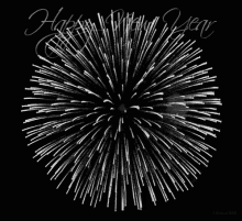 a black and white fireworks display with the words happy new year written below it