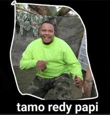 a man in a neon green sweater is giving a thumbs up with the words tamo redy papi below him