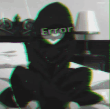 a blurry picture of a person with error written on their hoodie