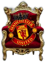 a red and gold chair with manchester united on it