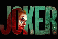 a poster for the movie joker shows a clown with a red scarf around his neck