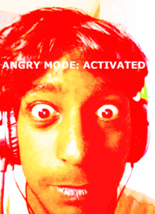 a person wearing headphones with the words angry mode activated on the bottom