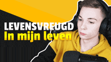 a young man wearing headphones stands in front of a microphone with the words levensvreugd in mijn leven written above him