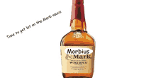 a bottle of morbidus mark whiskey with a sticker on it that says time to get let on the morb sauce