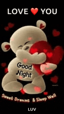 a teddy bear is hugging a heart with the words `` love you good night '' written on it .