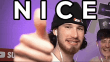 a man giving a thumbs up with the word nice written above him