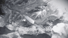 an aerial view of a snowy mountain with the words cope speaks below it