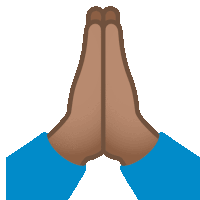 a person 's hands are folded together in prayer