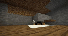 a screenshot of a minecraft game shows a room with a brick wall and a wooden floor