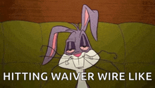 bugs bunny is sitting on a couch with a mask on his face and the words `` hitting waiver wire like '' .