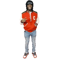 a man wearing a red and white varsity jacket and a black beanie is standing on a white background .