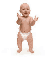 a baby in a diaper is standing up on its hind legs .