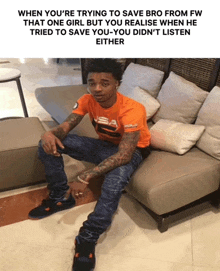 a man sitting on a couch with a caption that says when you 're trying to save bro