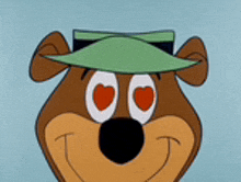 a cartoon bear wearing a green hat with hearts on his eyes