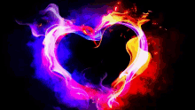 a colorful heart made of flames and smoke on a black background