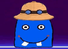 a blue monster wearing a hat and goggles .