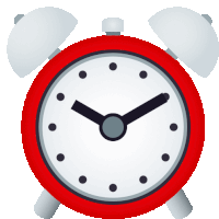 a red alarm clock with a white face and black circles