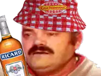 a man wearing a red and white checkered hat holds a bottle of picard