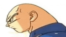 a close up of a cartoon character 's head with a very large head .