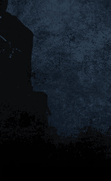 a dark blue background with a few white spots