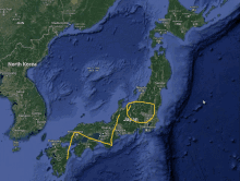 a map of japan and north korea with a yellow circle in the middle