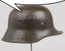 a military helmet with a speech bubble behind it